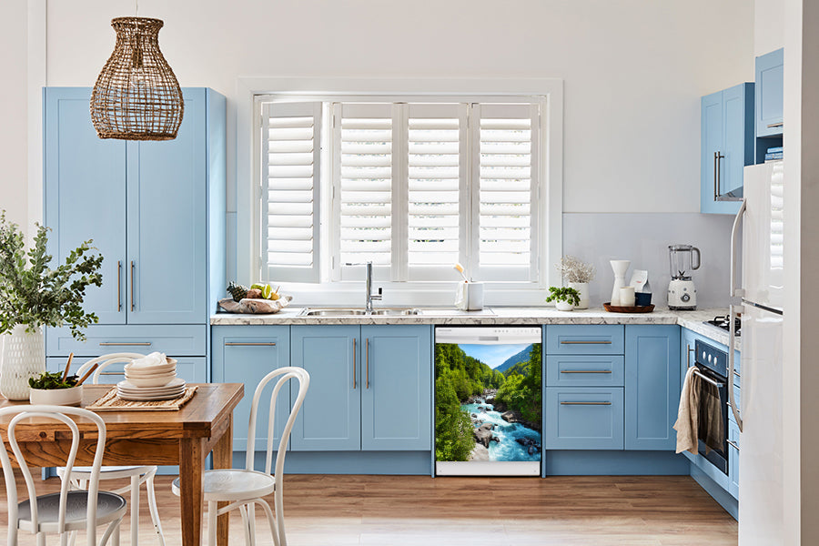 Breakfast table in kitchen with white walls, blue cabinets, marble countertop large window over sink area rapids country magnet skin on dishwasher white control panel
