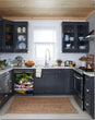Load image into Gallery viewer, Dark Gray Kitchen Cabinets with White Marble Countertop Against White Walls Window Behind Sink Flamingo Garden Magnet Skin on Dishwasher Black Control Panel