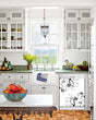 Load image into Gallery viewer, Kitchen with White Cabinets Green Countertop Terra Cotta Floor Kitchen Sink with Window next to Swirling Flowers Magnetic Dishwasher Cover Skin on Dishwasher with White Control Panel
