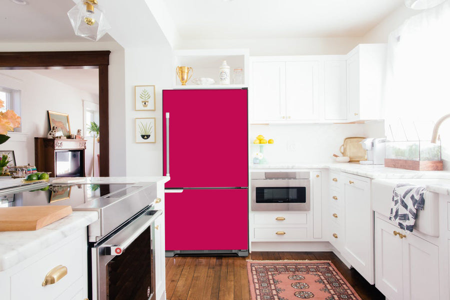  Full Kitchen Layout Wood Floors Hot Pink Magnet Skin on Refrigerator Model Type Bottom Freezer Next to Recessed Microwave Surrounding White Cabinets and White Countertop 