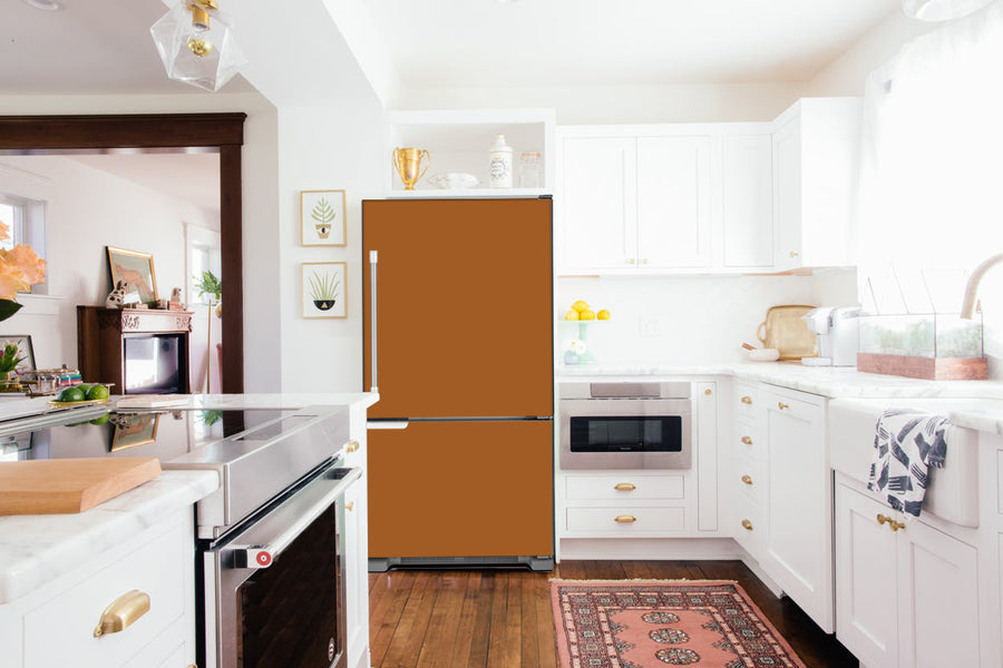  Full Kitchen Layout Wood Floors Metal Copper Magnet Skin on Refrigerator Model Type Bottom Freezer Next to Recessed Microwave Surrounding White Cabinets and White Countertop 