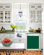 Load image into Gallery viewer, Kitchen with White Cabinets Green Countertop Terra Cotta Floor Kitchen Sink with Window next to Forest Green Magnet Skin on Dishwasher with White Control Panel
