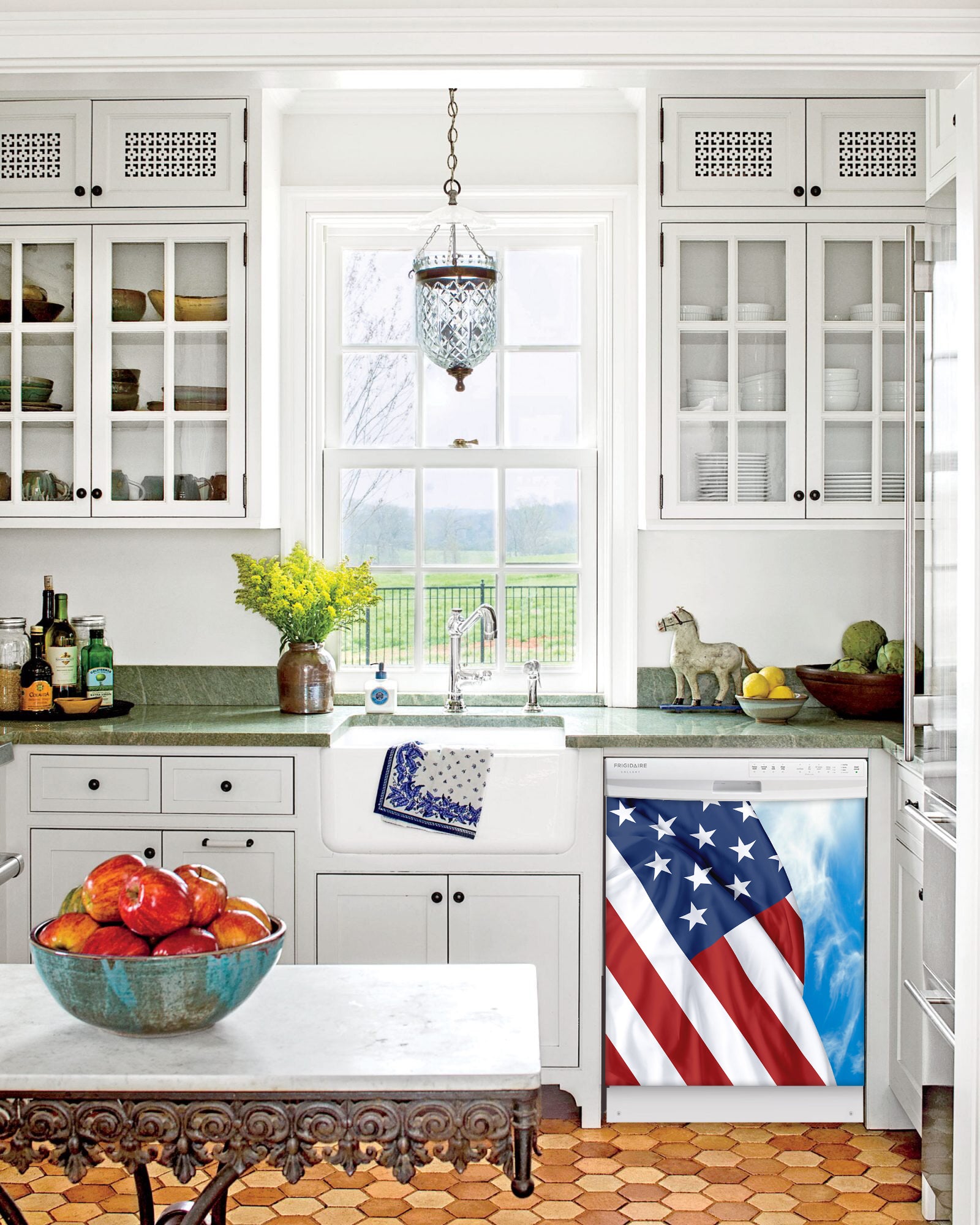 Kitchen with White Cabinets Green Countertop Terra Cotta Floor Kitchen Sink with Window next to Majestic USA Flag Magnet Skin on Dishwasher with White Control Panel