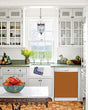Load image into Gallery viewer, Kitchen with White Cabinets Green Countertop Terra Cotta Floor Kitchen Sink with Window next to Metal Copper Magnet Skin on Dishwasher with White Control Panel
