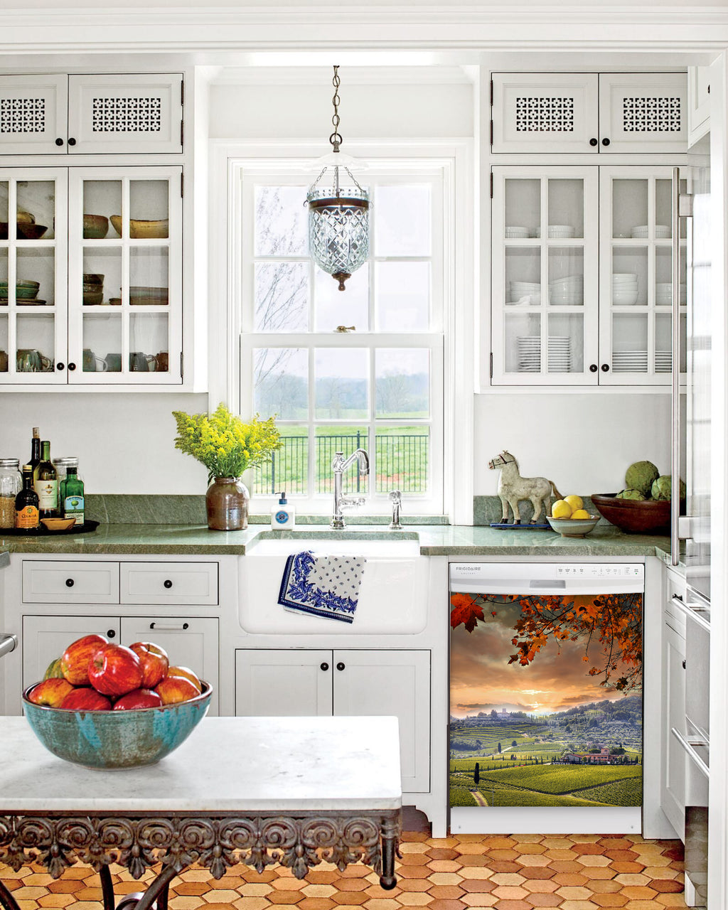 Kitchen with White Cabinets Green Countertop Terra Cotta Floor Kitchen Sink with Window next to Quiet Country Magnet Skin on Dishwasher with White Control Panel
