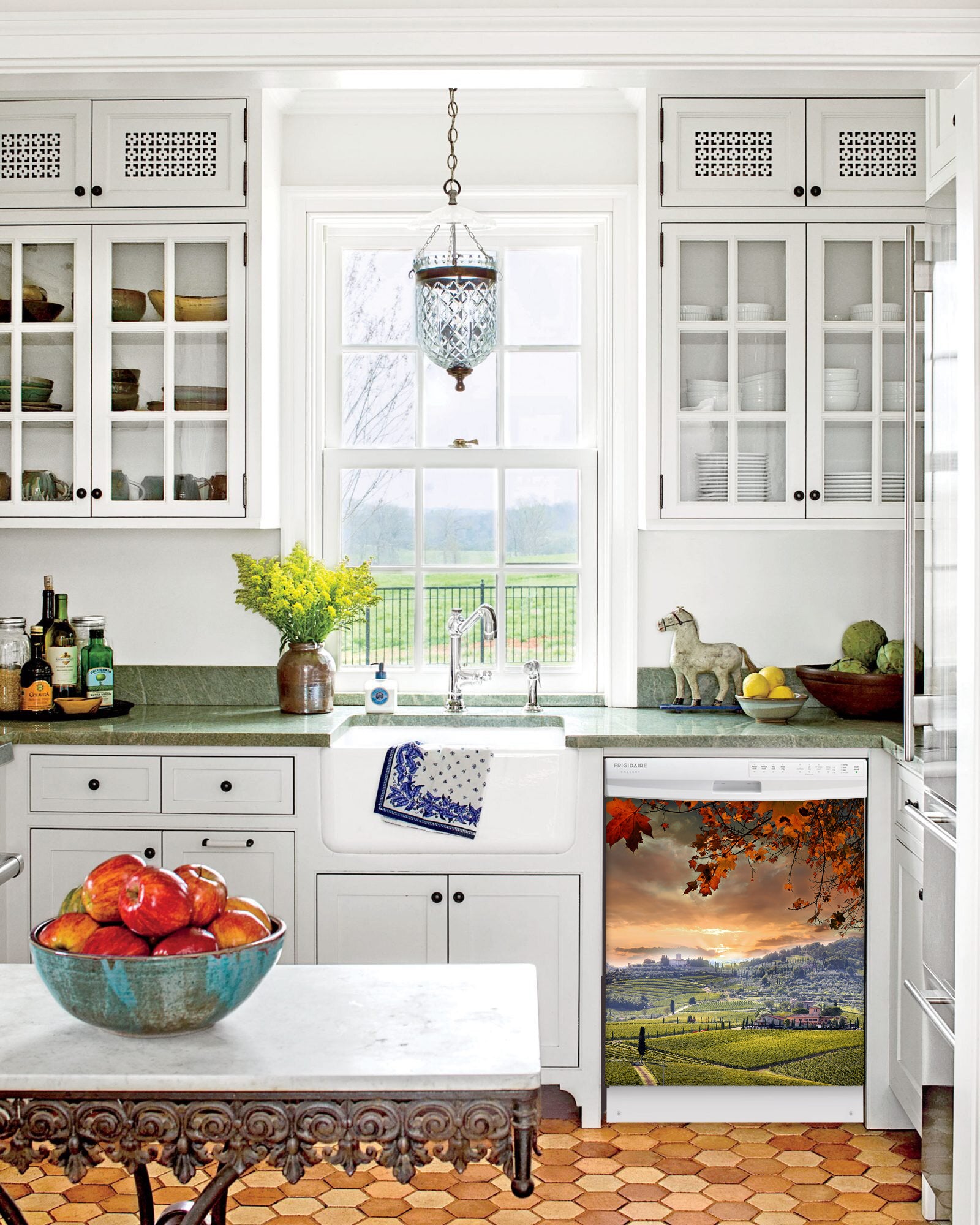 Kitchen with White Cabinets Green Countertop Terra Cotta Floor Kitchen Sink with Window next to Quiet Country Magnet Skin on Dishwasher with White Control Panel