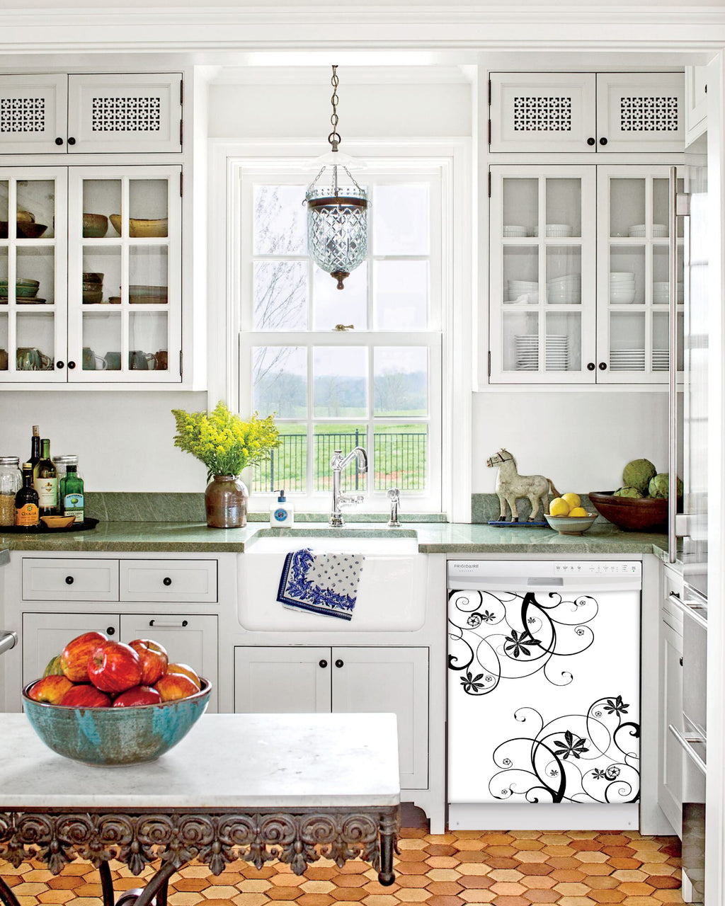 Kitchen with White Cabinets Green Countertop Terra Cotta Floor Kitchen Sink with Window next to Swirling Flowers Magnetic Dishwasher Cover Skin on Dishwasher with White Control Panel