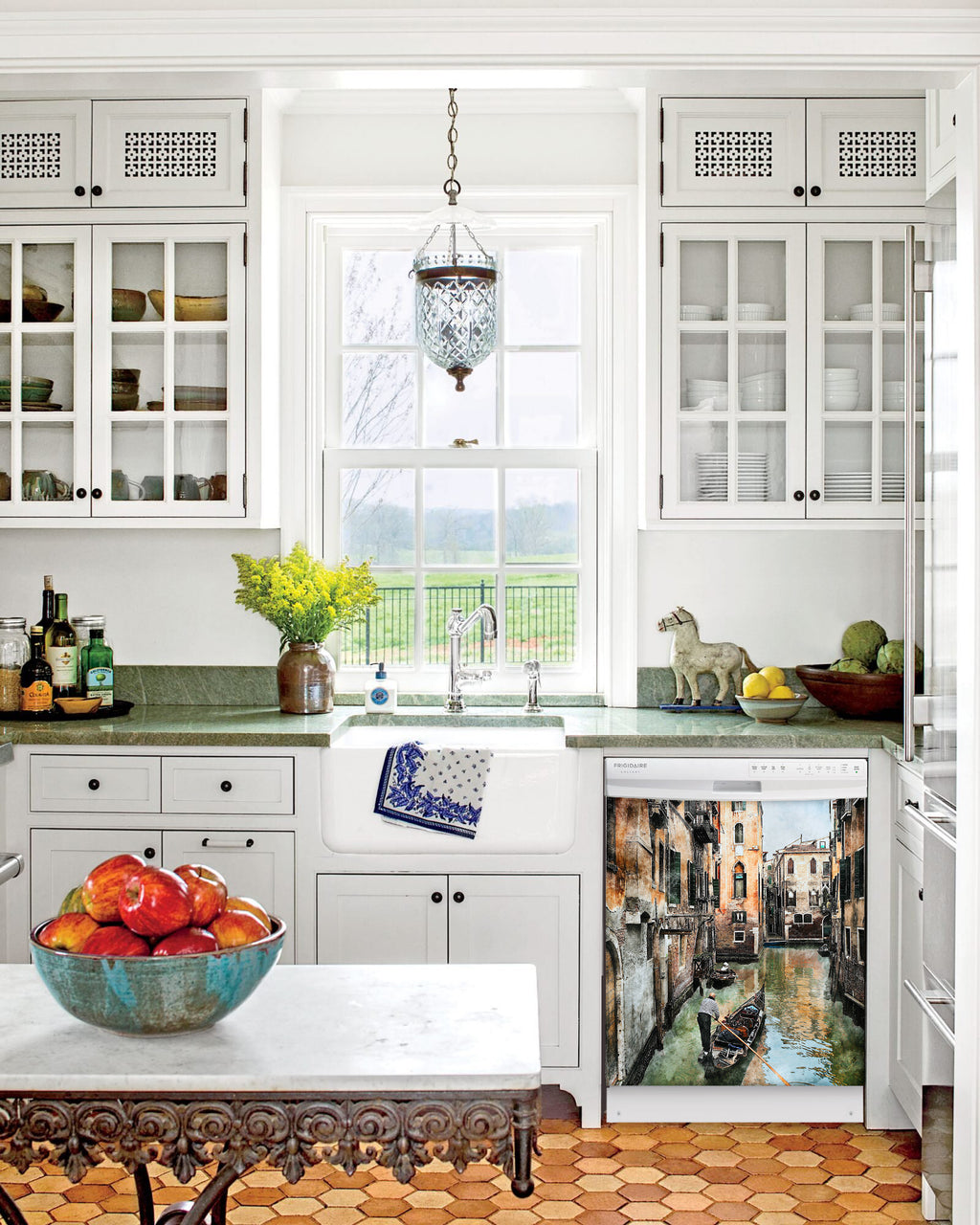 Kitchen with White Cabinets Green Countertop Terra Cotta Floor Kitchen Sink with Window next to Venice Canals Magnet Skin on Dishwasher with White Control Panel