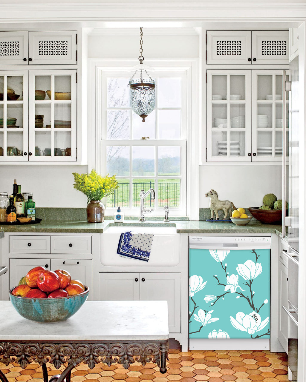 Kitchen with White Cabinets Green Countertop Terra Cotta Floor Kitchen Sink with Window next to White Magnolias Magnet Skin on Dishwasher with White Control Panel