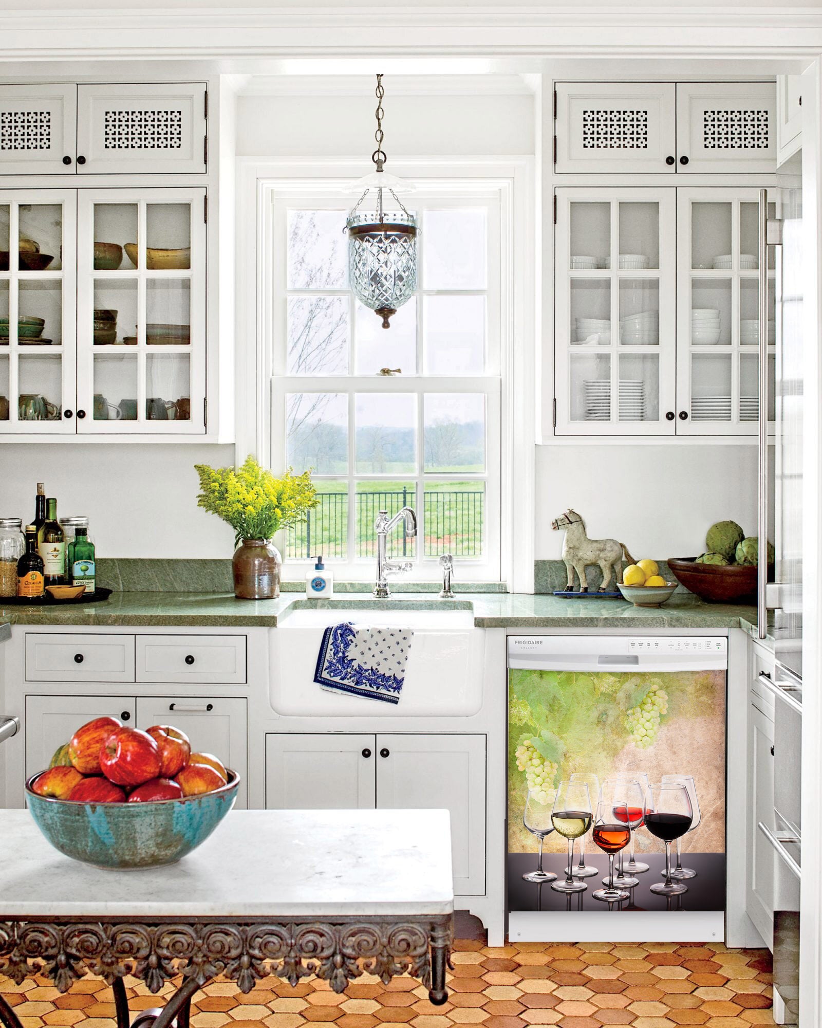 Kitchen with White Cabinets Green Countertop Terra Cotta Floor Kitchen Sink with Window next to Wine Tasting Magnetic Dishwasher Cover Skin on Dishwasher with White Control Panel